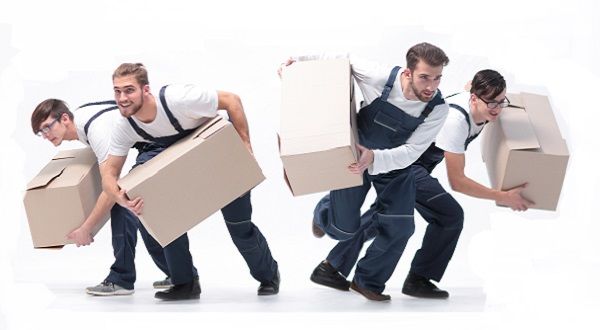 4 men with boxes, moving fast